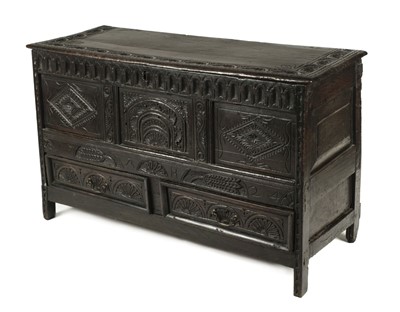 Lot 250 - Coffer. An 18th century carved oak mule chest