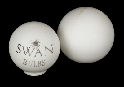 Lot 321 - Petrol Pump Globes. A Swan Bulbs glass globe plus another