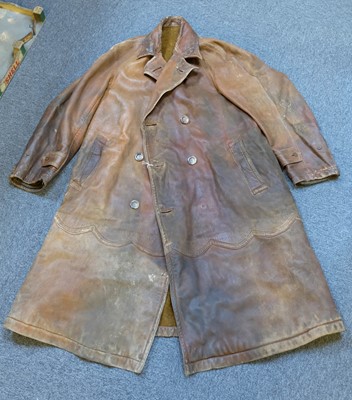 Lot 307 - Motoring Overcoat. Two 1930s leather overcoats