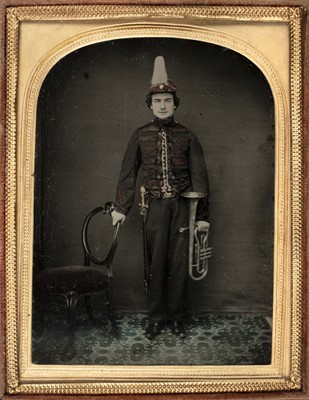 Lot 161 - Quarter-plate ambrotype of a young bandsman, by R[ichard] B[ritton] Bustin, Hereford, c.1858
