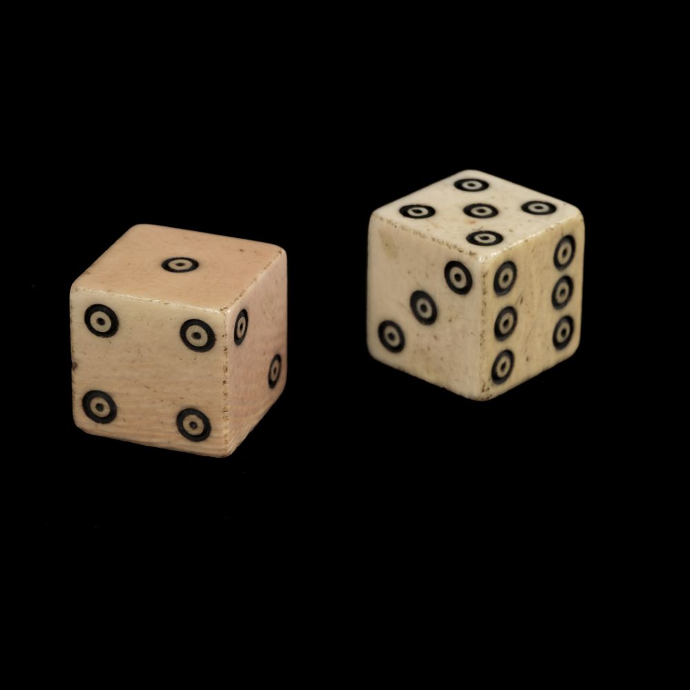 Lot 13 Dice. A pair of III period ivory dice,