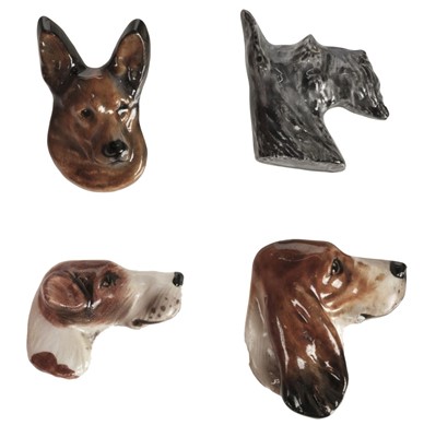 Lot 174 - Royal Doulton. A collection of dog brooches