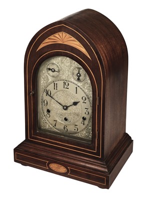 Lot 238 - Clock. An Edwardian style inlaid mantel clock