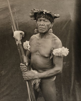 Lot 394 - Lavery (Peter, 1948-). Yawalapiti man with speared fish, [Brazil], c. 1990