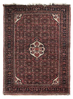 Lot 85 - Carpet. An early 20th century Oriental heavy pile woollen carpet