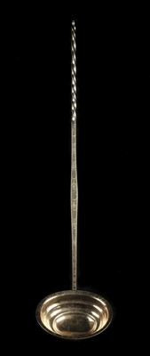 Lot 140 - Toddy Ladle. A George III silver-gilt toddy ladle by John Shea, London 1809