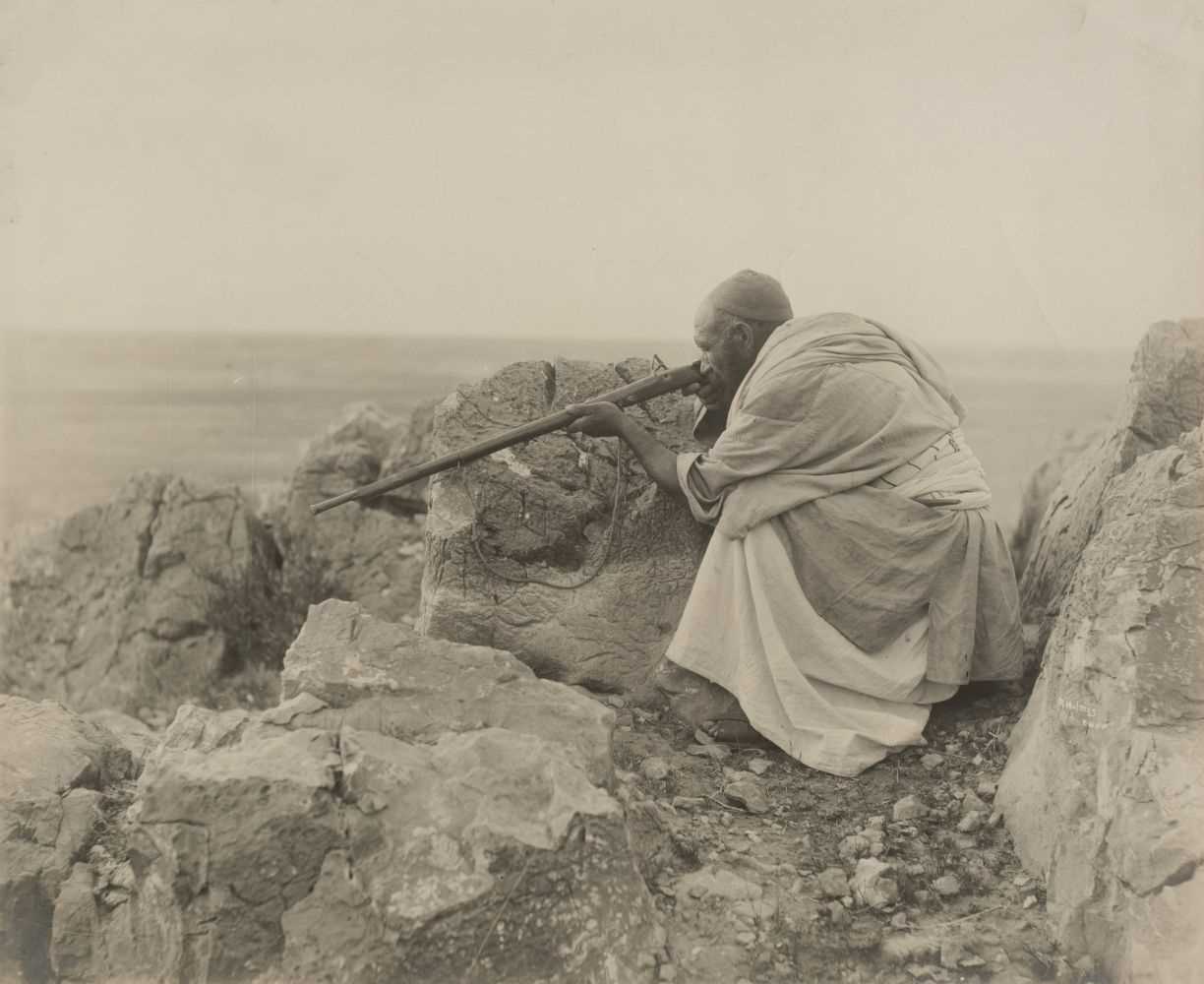 Lot 235 - Holmes (Randolph Bezzant, 1888-1973). A group of 12 photographs of tribespeople and views, c. 1920