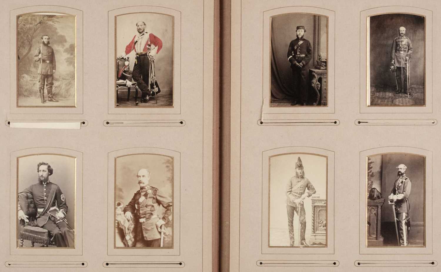 Lot 204 - Miltary Officers. An album containing 10 cabinet cards and 70 cartes de visite