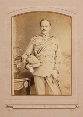Lot 204 - Miltary Officers. An album containing 10 cabinet cards and 70 cartes de visite