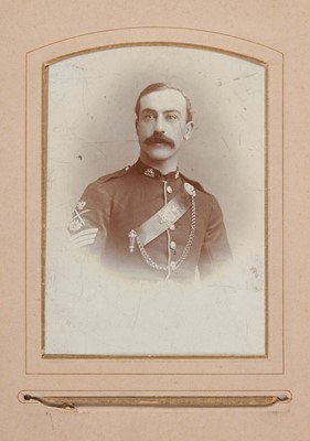 Lot 204 - Miltary Officers. An album containing 10 cabinet cards and 70 cartes de visite