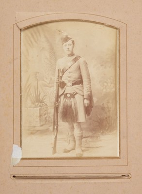 Lot 204 - Miltary Officers. An album containing 10 cabinet cards and 70 cartes de visite