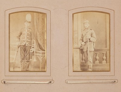 Lot 204 - Miltary Officers. An album containing 10 cabinet cards and 70 cartes de visite