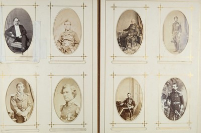 Lot 201 - Royal Navy. An album containing 64 cartes de visite and 18 cabinet cards