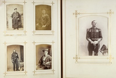 Lot 201 - Royal Navy. An album containing 64 cartes de visite and 18 cabinet cards