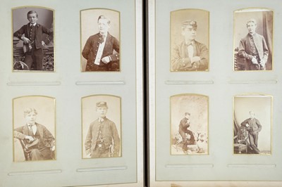 Lot 201 - Royal Navy. An album containing 64 cartes de visite and 18 cabinet cards