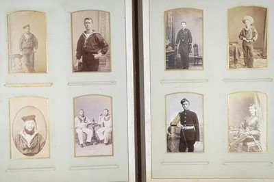 Lot 201 - Royal Navy. An album containing 64 cartes de visite and 18 cabinet cards