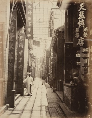 Lot 248 - Thomson (John, 1837-1921). A Street [Physic Street] in Canton, c. 1869, albumen print