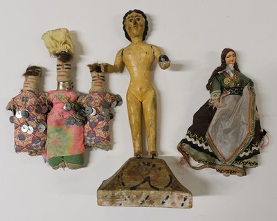 Lot 480 - Dolls. A primitive wooden doll on plinth, possibly South American, 19th century