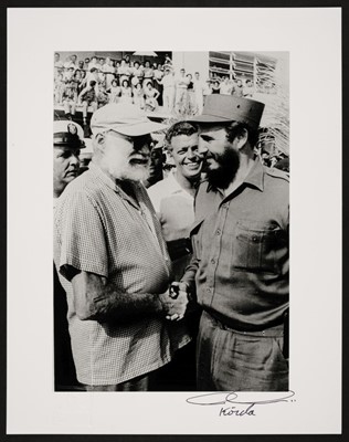 Lot 541 - Korda (Alberto, 1928-2001). Fidel Castro and Ernest Hemingway shaking hands, 1960, printed c. 2000