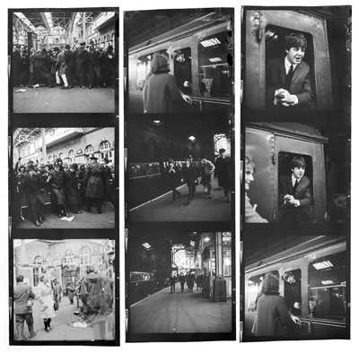 Lot 96 - The Beatles: A Hard Day's Night. The Beatles and fans at Marylebone station, London