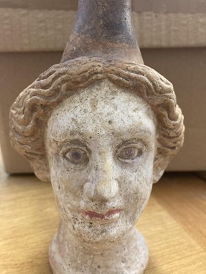 Lot 187 - Roman. A Roman terracotta female head ewer