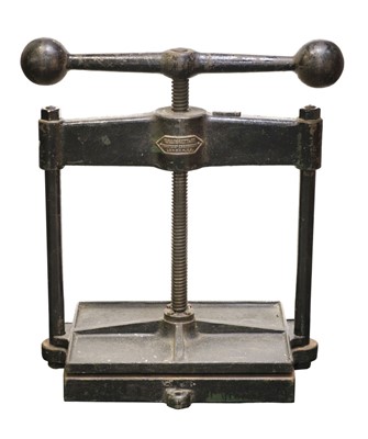 Lot 481 - Nipping press. A large cast iron nipping press by W. H. Lockett & Co., London