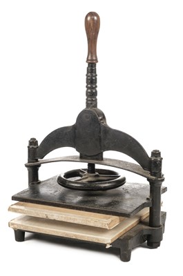Lot 482 - Press. A small cast iron press by Waterlow & Sons, London