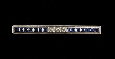 Lot 68 - Brooch. Art Deco diamond and sapphire bar brooch