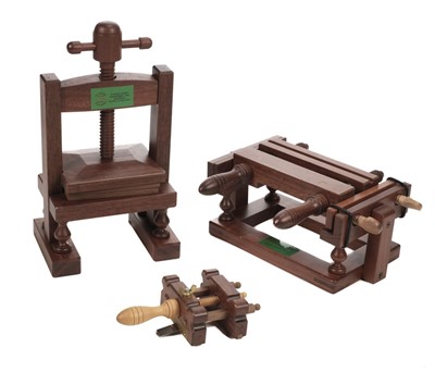 Lot 490 - Miniature Bookbinding equipment. A miniature Laying press, plough and Standing press by F.H. Wiesner