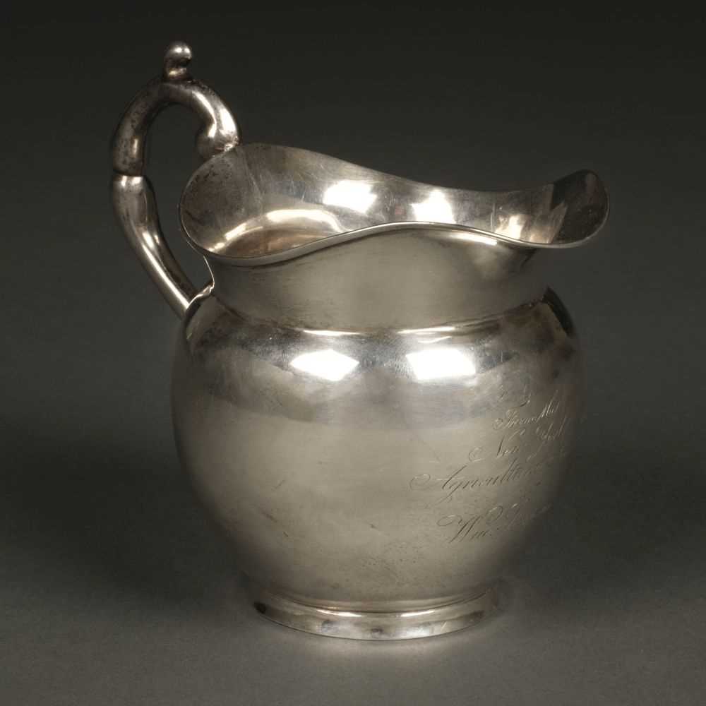 Lot 12 - American Silver. Presentation milk jug by John Crawford, New York circa 1815