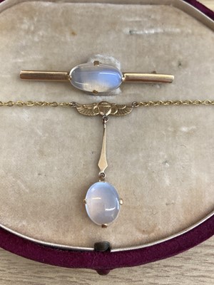 Lot 79 - Jewellery Suite. Egyptian Revival gold and moonstone suite