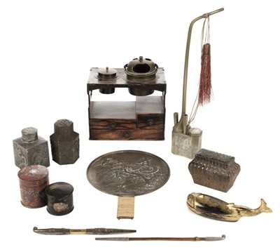 Lot 173 - Oriental. A mixed collection including opium pipes and cabinet
