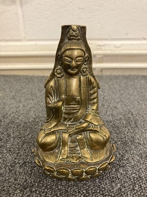 Lot 175 - Tibetan Figures. A collection of brass figures