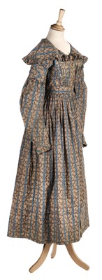 Lot 232 - Clothing. A printed cotton day dress, circa 1840s, & 2 other garments