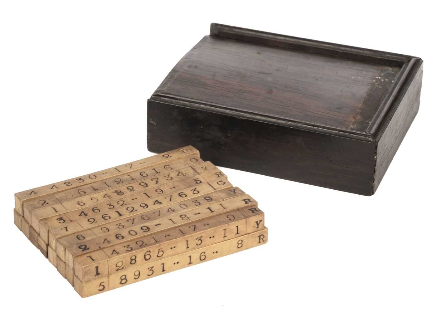 Lot 448 - Game. A boxed set of number and letter rods, early 19th century