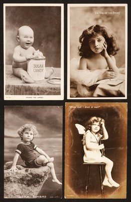 Lot 241 - Postcards. An album containing approximately 300 postcards of children and infants