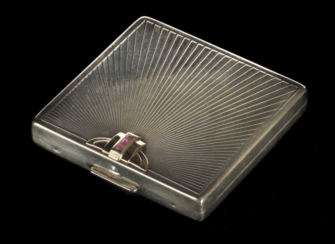 Lot 102 - Tiffany & Co. A silver and gold compact