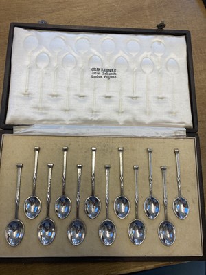Lot 38 - Omar Ramsden. Cased silver tea and coffee spoons