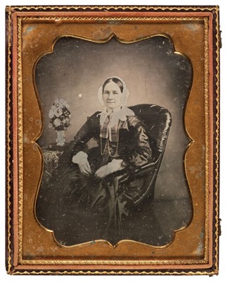 Lot 32 - Daguerreotypes. Two hand-tinted daguerreotypes of unidentified women, circa 1855