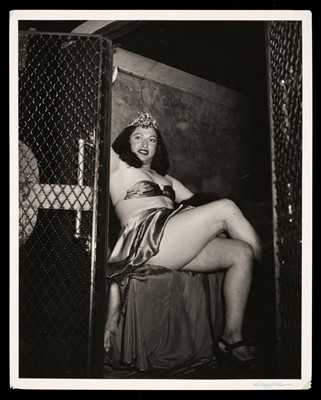 Lot 100 - Weegee (a.k.a. Arthur Fellig, 1899-1968). Drag Queen in a Paddy Wagon, circa 1940s