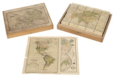 Lot 455 - Victorian Map Block Puzzle. A boxed set of map puzzle blocks, Paris, late 19th century