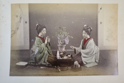 Lot 64 - Japan. A concertina album of 50 colour tinted albumen prints