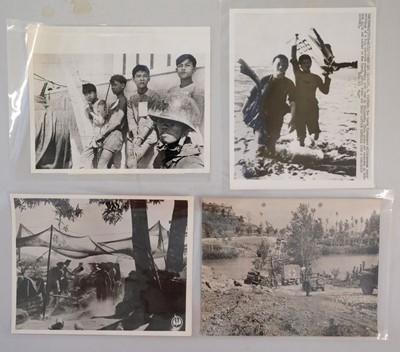 Lot 224 - World War II & Vietnam. A group of approximately 80 press photographs