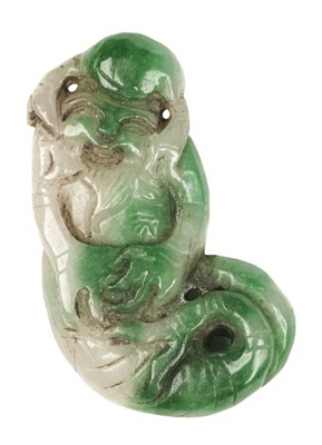 Lot 153 - Jade. Chinese apple green jade pebble