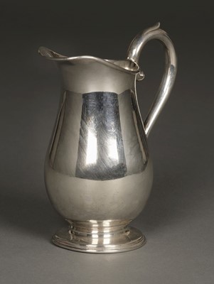 Lot 23 - Jug. Edwardian silver baluster jug by Cooper Brothers & Sons, Sheffield 1924