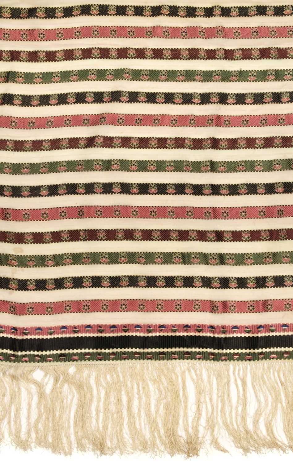 Lot 303 - Shawl. A woven silk satin and gauze shawl, circa 1810-1820