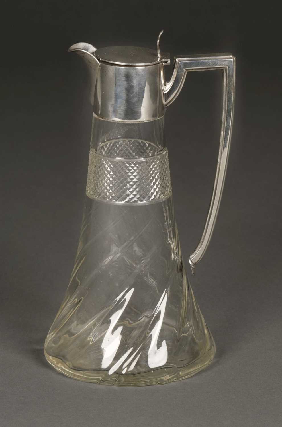 Lot 11 - Claret Jug. Silver top claret jug by Walker & Hall, Sheffield, 1909