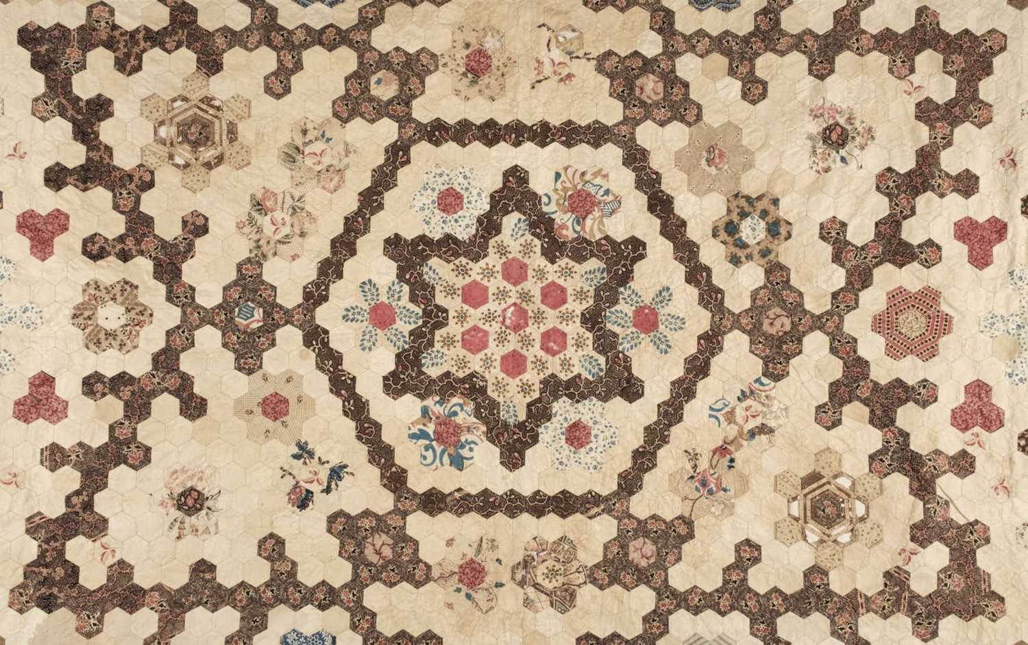 Lot 273 - Quilt. A Victorian patchwork hexagon quilt, English