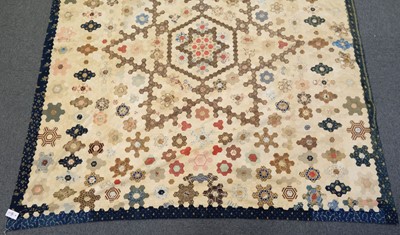 Lot 273 - Quilt. A Victorian patchwork hexagon quilt, English