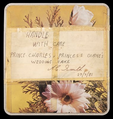 Lot 142 - Charles (1948) Prince of Wales & Diana (1961-1997) Princess of Wales. A large slice of cake